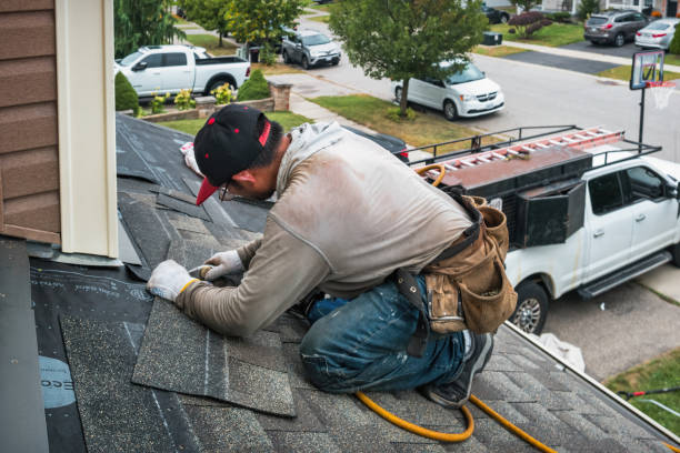 Professional Emergency Roof Repair technician working in Palmersville, TN